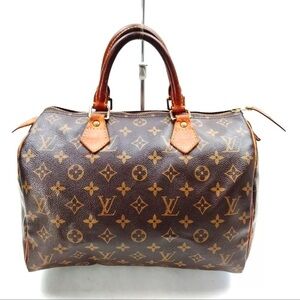 Louis Vuitton speedy 30 monogram canvas and leather.